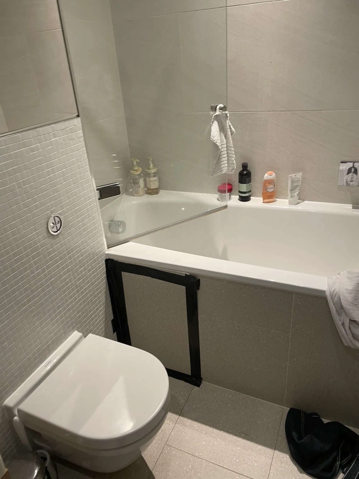 Bathroom vanity bath and tiled finish