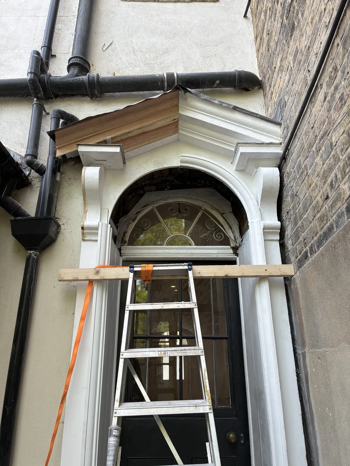 Decorative period entrance surround during restoration